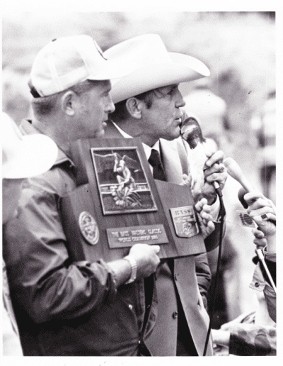1986 Bass Masters Classic, Lakes Chickamauga and Nickajack. Ray Scott speaks to the crowd as Harold Sharp holds the 16th Classic trophy. Photo Stan Fagerstrom.