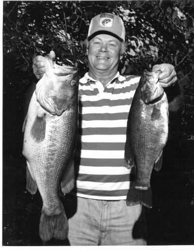 1970s Hubert Green with an 8lb Smallmouth and 14lb Largemouth from Lure Lake.