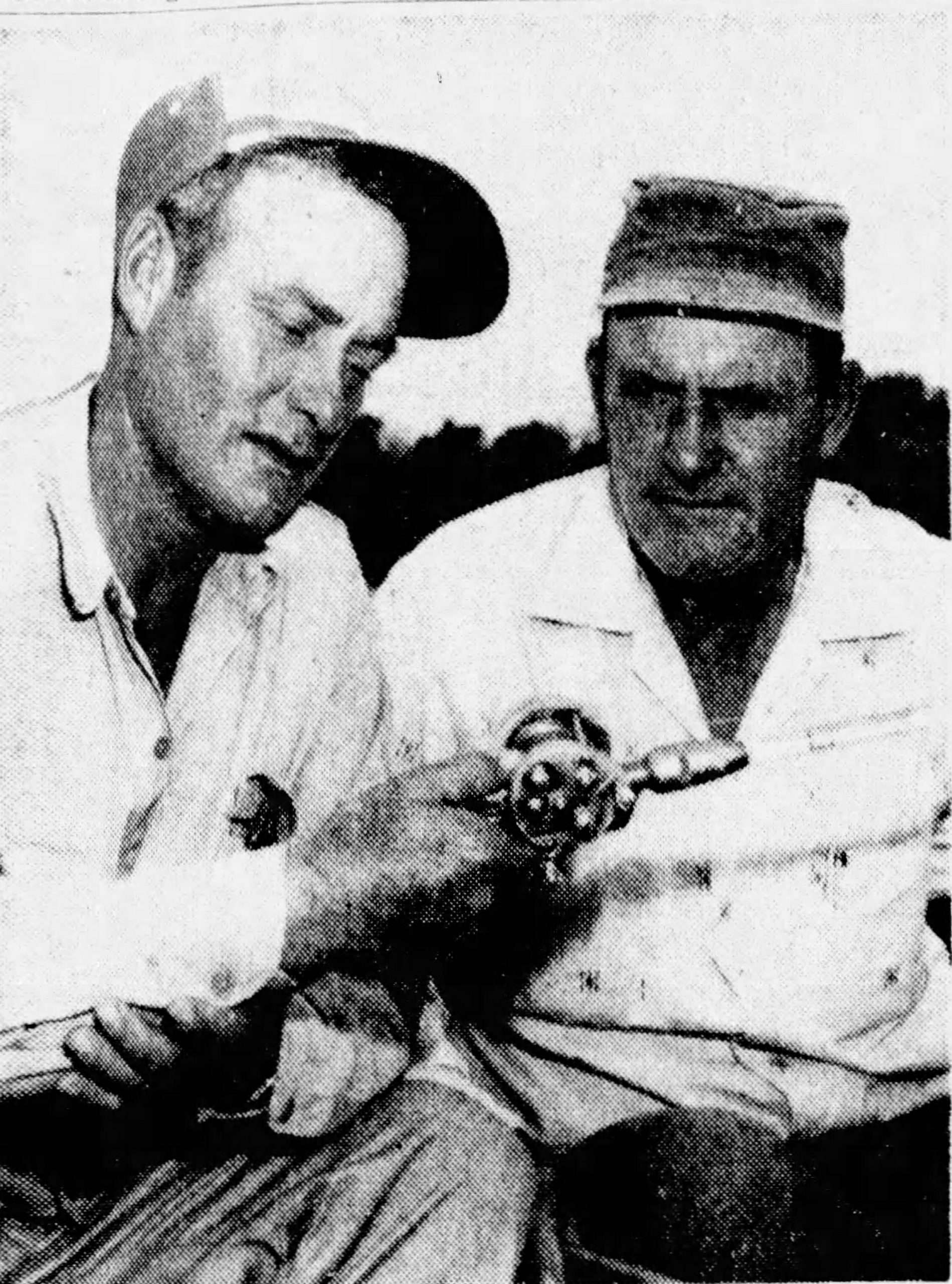 Findley-Creel_May_1958 Original Caption: BASS KINGS - Ray Creel, left, and Herman Findley, of Keene, are the defending champions in the annual state black bass tournament which this year will be held on the Highland Lakes, May 22-25. May 1958, Fort Worth Star-Telegram, Star-Telegram photo