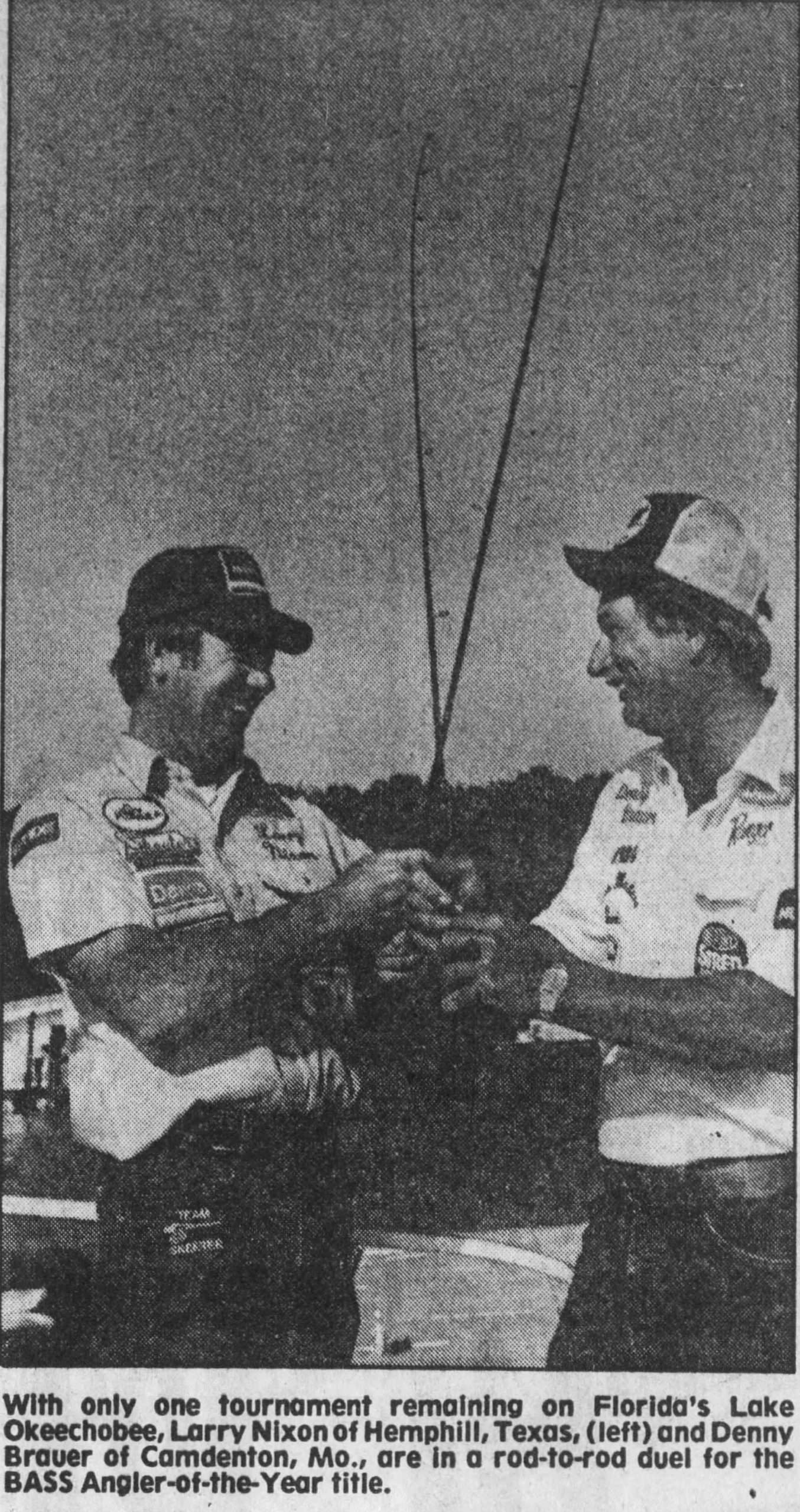 Nixon and Brauer The Times Sunday May 26, 1985 Original Caption: With only one tournament remaining on Florida’s Lake Okeechobee, Larry Nixon of Hemphill, Texas (left) and Denny Brauer of Camdenton, MO., are in a rod-to-rod duel for the BASS Angler-of-the-Year title. The Times Sunday May 26, 1985. No photo credit.