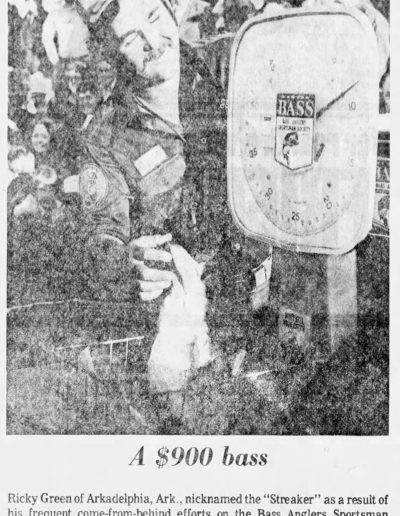 Ricky Green weighs his Classic record big bass that helped him place third after blanking on day one. Photo: The Times Sunday November 14 1976.