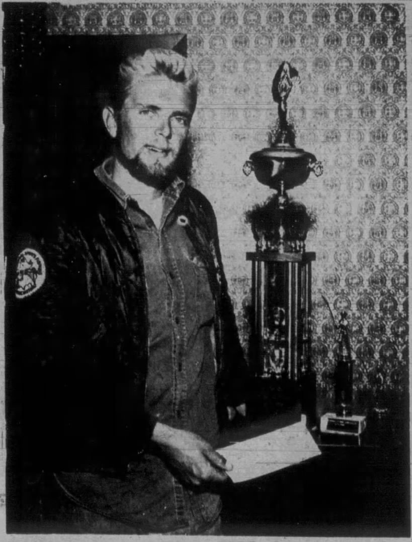 Original caption: "AL LINDNER, Gull lake tackle manufacturer, is shown with the trophies he earned Sept. 26-28 in winning the National Fishing Tournament at Stone Lake, Wis. Minnesota's only representative in the tourney, Lindner earned $1,650 in the three-day derby while claiming trophies for largest fish and best three-man team. The tourney point system allowed one point per ounce for northerns and three for bass and walleyes with only artificial bait being used. Since moving here from Chicago with his brother Ron and family May 1, Lindner has been guiding numerous parties out of Nisswa Bait Shop to impressive walleye, northern and bass catches in lakes of the Gull Lake chain. The brothers say locating fish is 60 percent of the battle and using the right bait accounts for the remaining 40 percent." Brained Dispatch, Oct. 8, 1968.