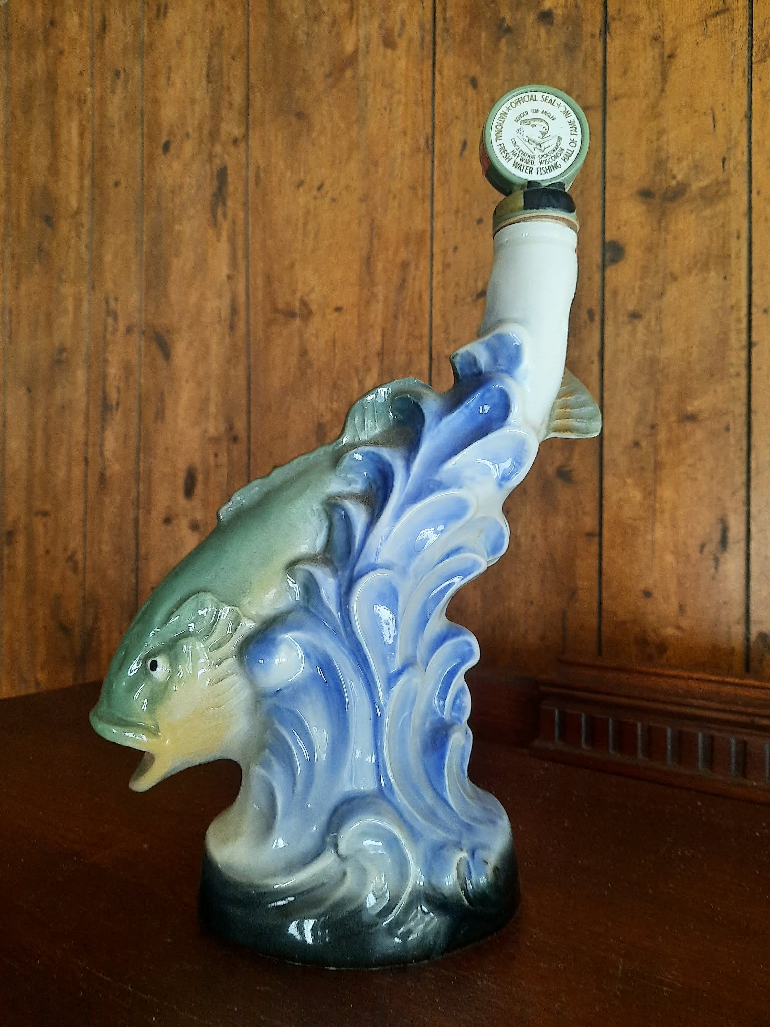 Backside of Jim Beam bass decanter, made for the Fresh Water Fishing Hall of Fame and Museum.