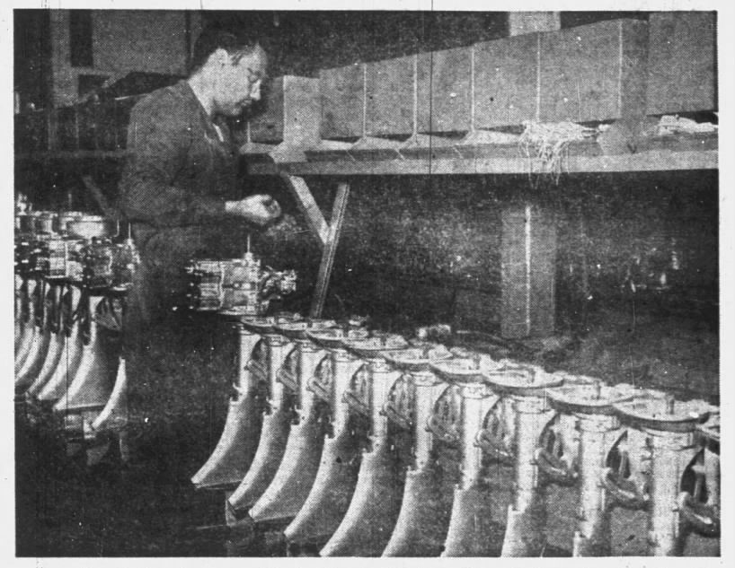 Original caption: A section of the primary assembly department of Martin Motors, with the motors shown in various stages of the assembly process. John G. Schubert is the man on the job. Eau Claire Sunday Leader, Eau Claire, Wisconsin, Sunday, October 19, 1947.