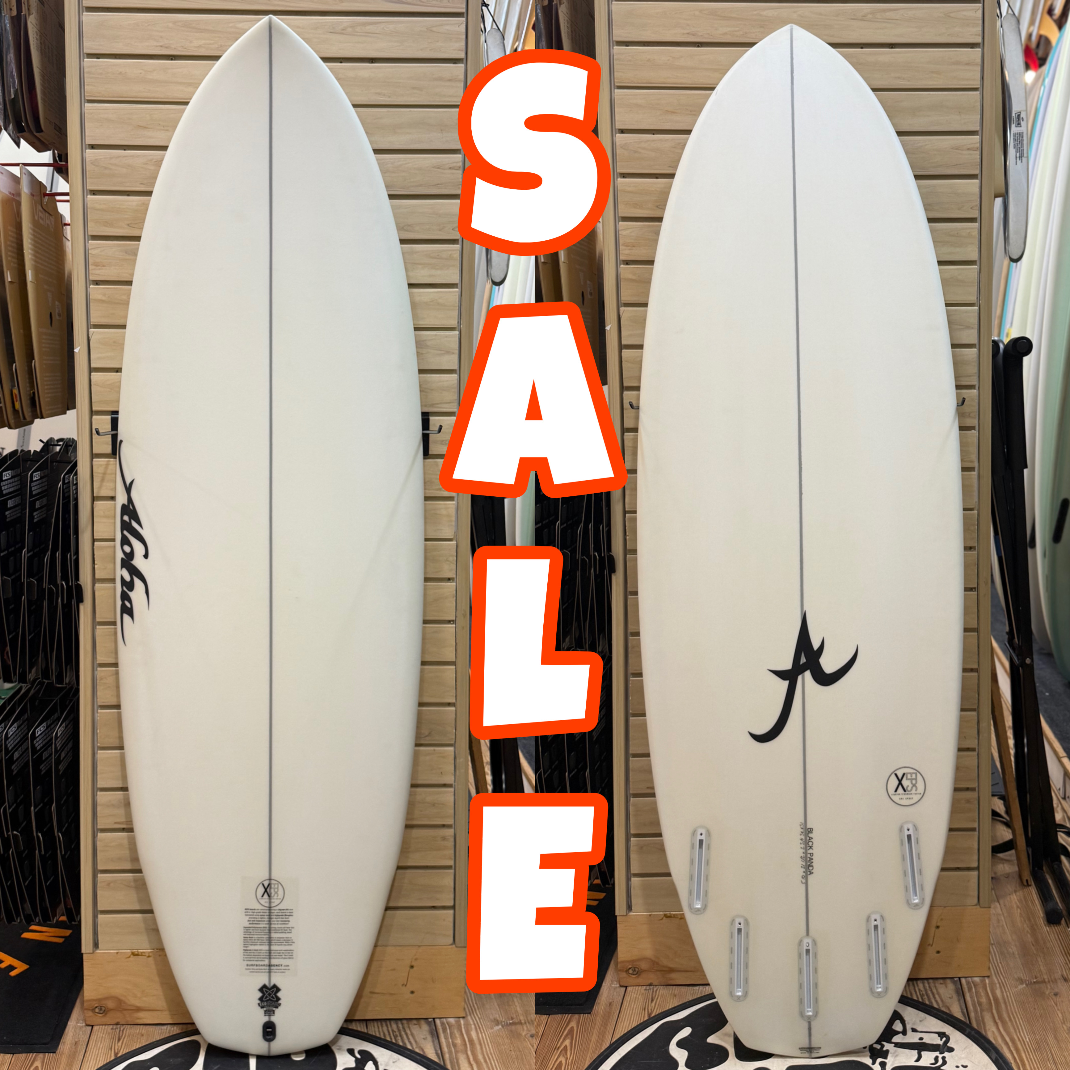 5'10 Black Panda XE Clear  surfboard top photo