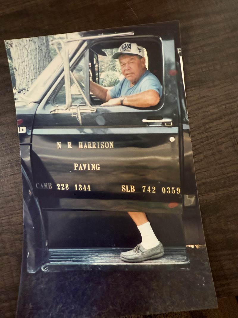 photo of owner Naylor Harrison getting into truck in the late 1970s