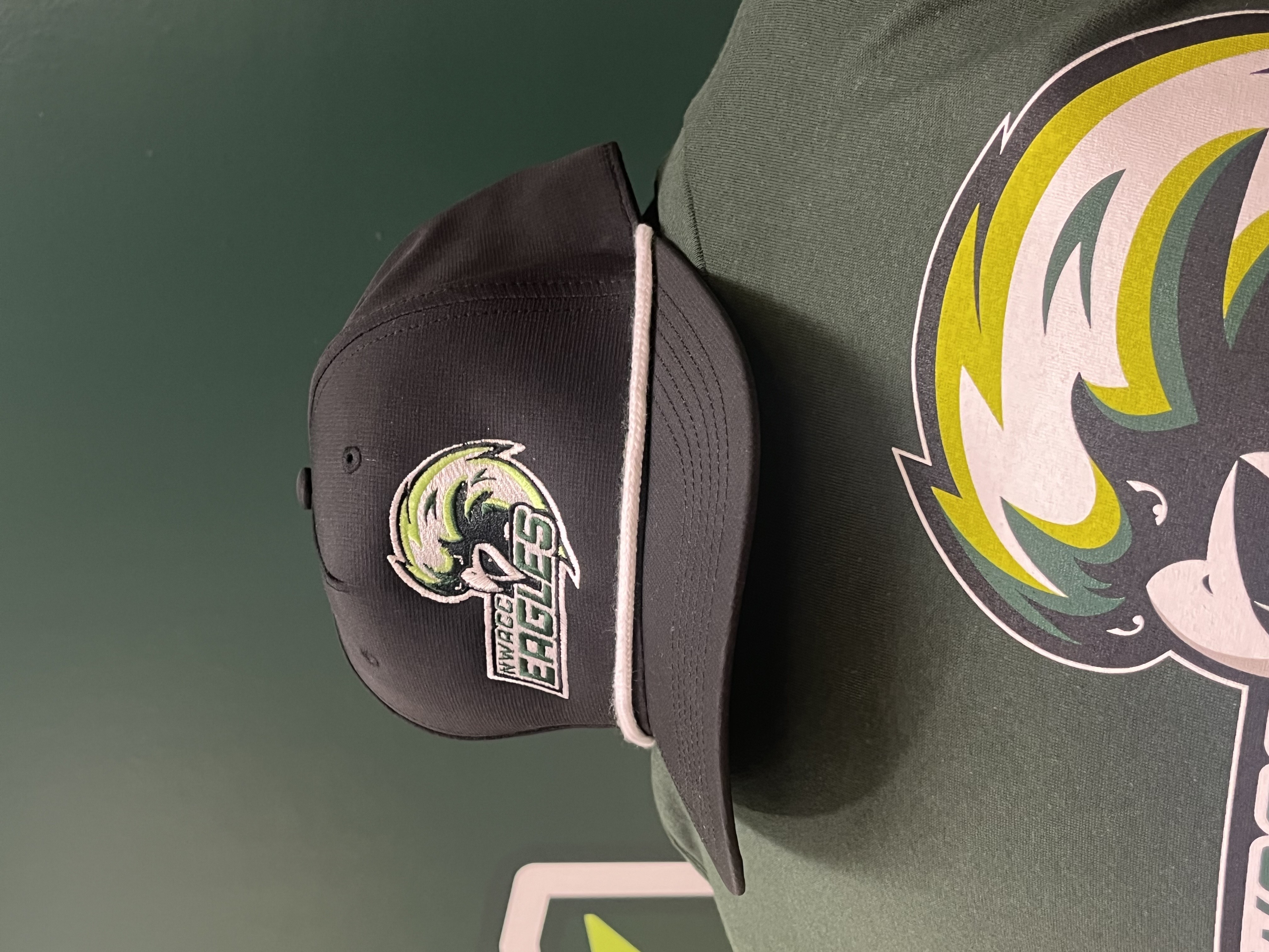 NWACC Eagles Black Trucker Hat with White Braided Rope