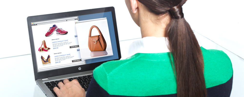 Woman browsing the internet on her laptop.