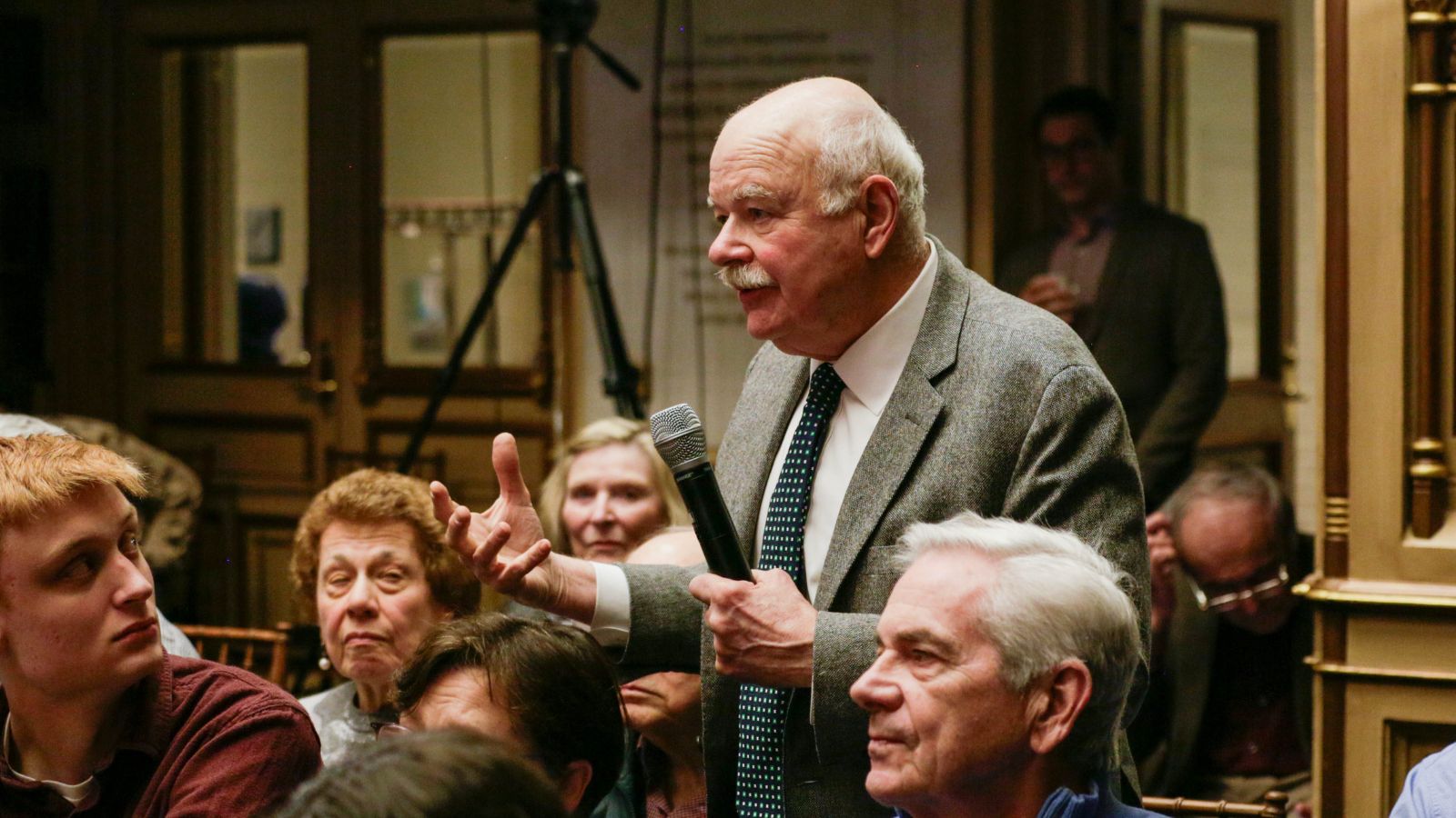 Audience member asks a question