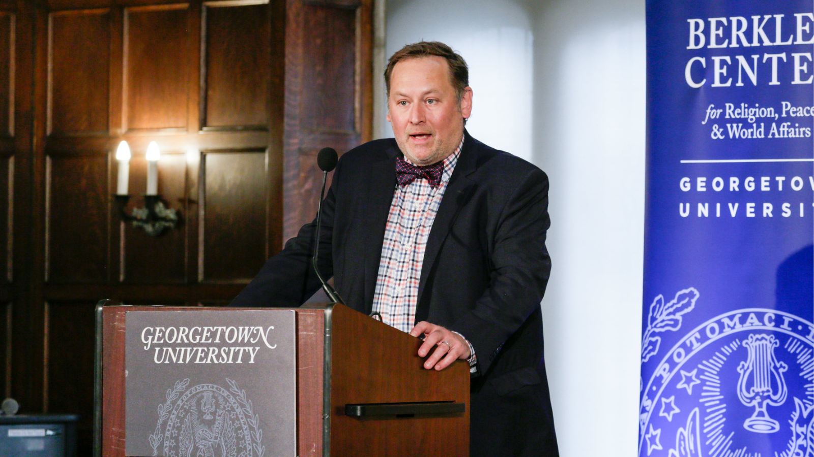 Michael Kessler, executive director of the Berkley Center for Religion, Peace, and World Affairs, introduces the panel.