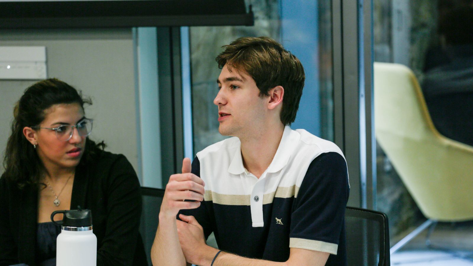 Alex Johnson (C'25) engaging in the panel discussion.