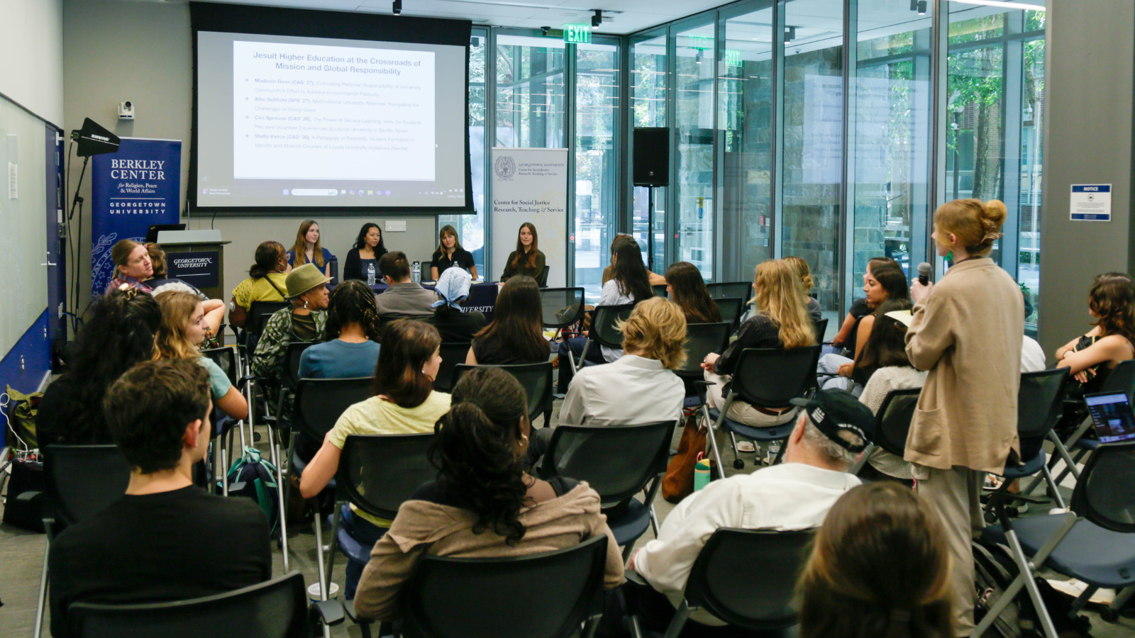 Attendees engage in a Q&A with the 2025 Education and Social Justice Fellows featured in the first of three panels.