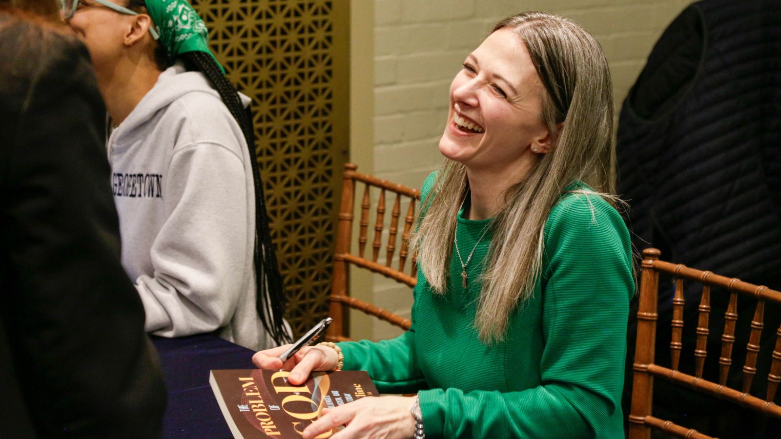 Erin Cline signs books.