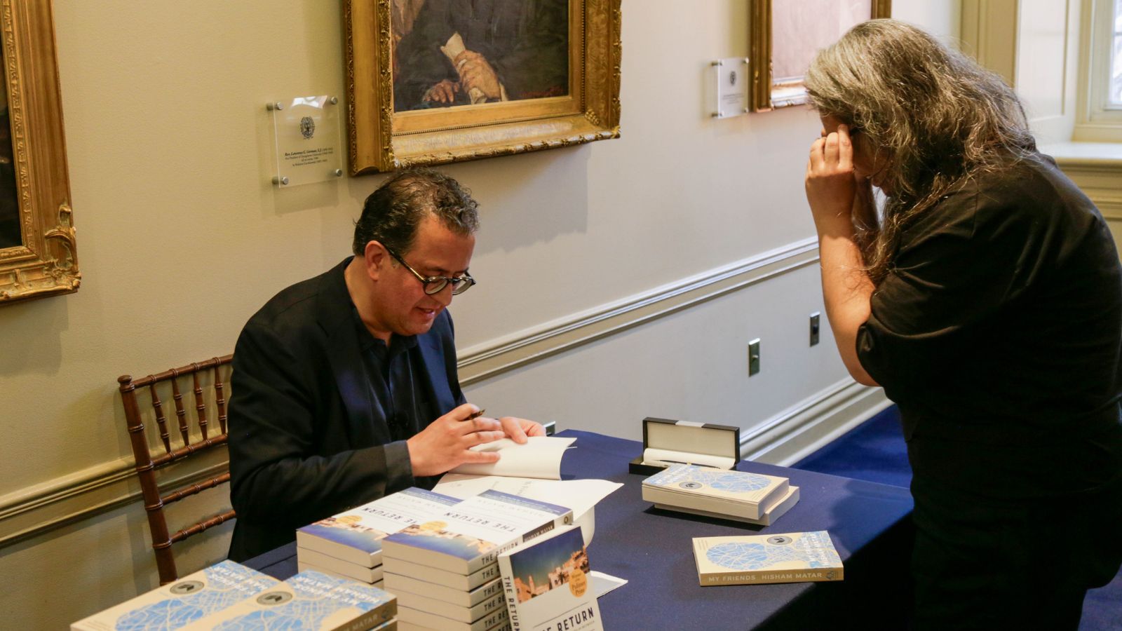 Hisham Matar signs copies of his new book "My Friends."