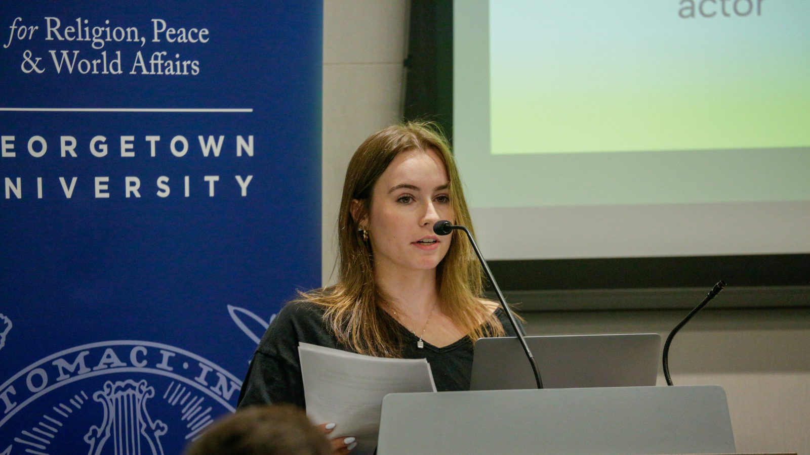 Sarah Kidd (C'26) presents on the role of religion in the Russia-Ukraine war