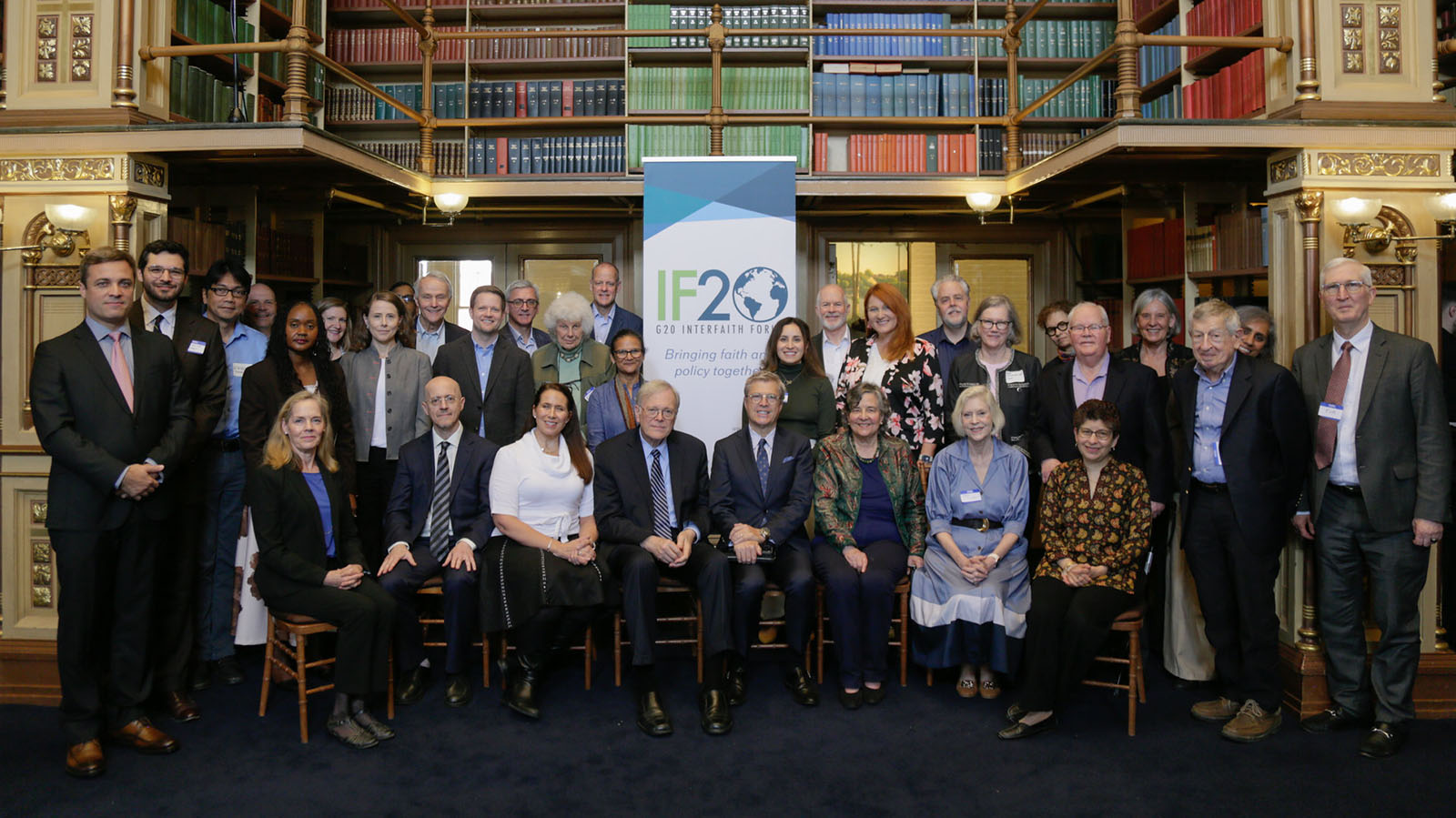 Participants in the G20 Interfaith Forum policy forum and workshop gathered in Georgetown University's Riggs Library