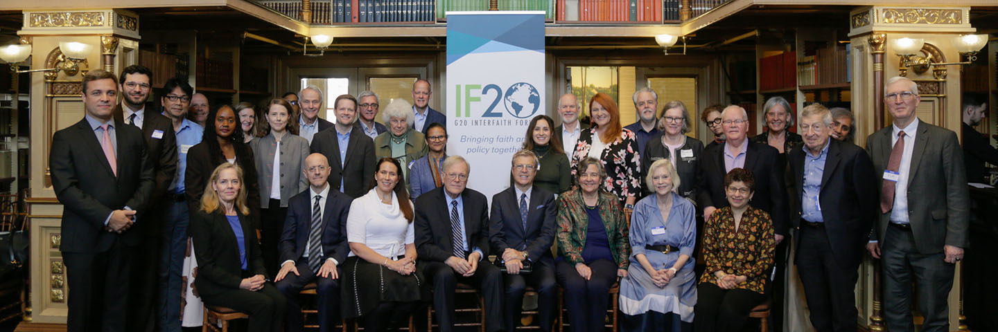 Participants in the G20 Interfaith Forum policy forum and workshop gathered in Georgetown University's Riggs Library