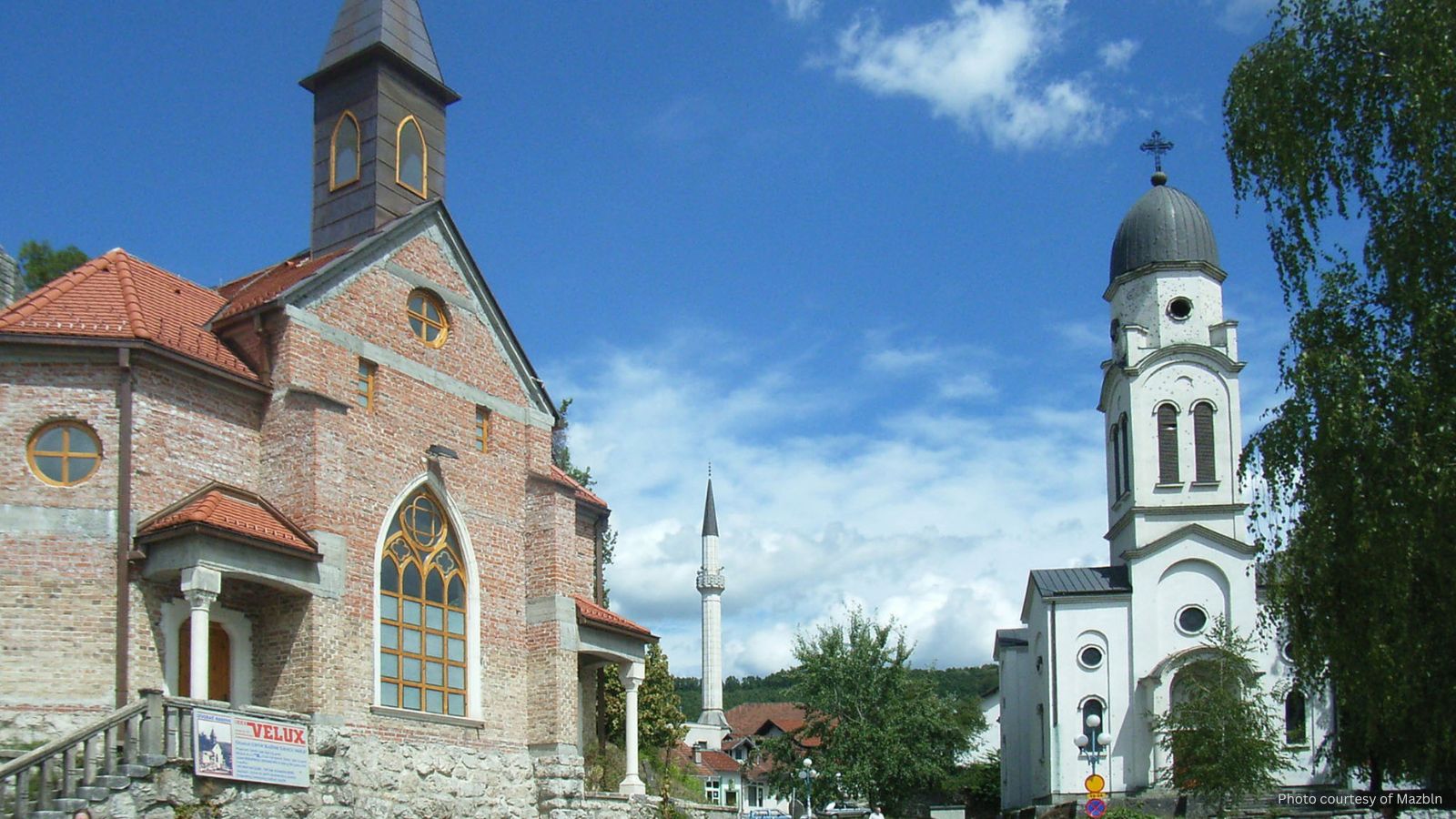 A Catholic Church, a Serbian Orthodox church, and a mosque in Bosanska Krupa. Photo courtesy of Mazbln.
