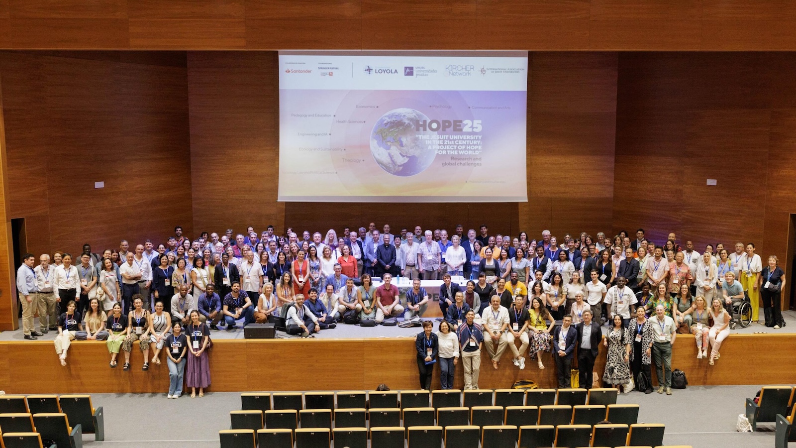 People gathered on stage during a conference
