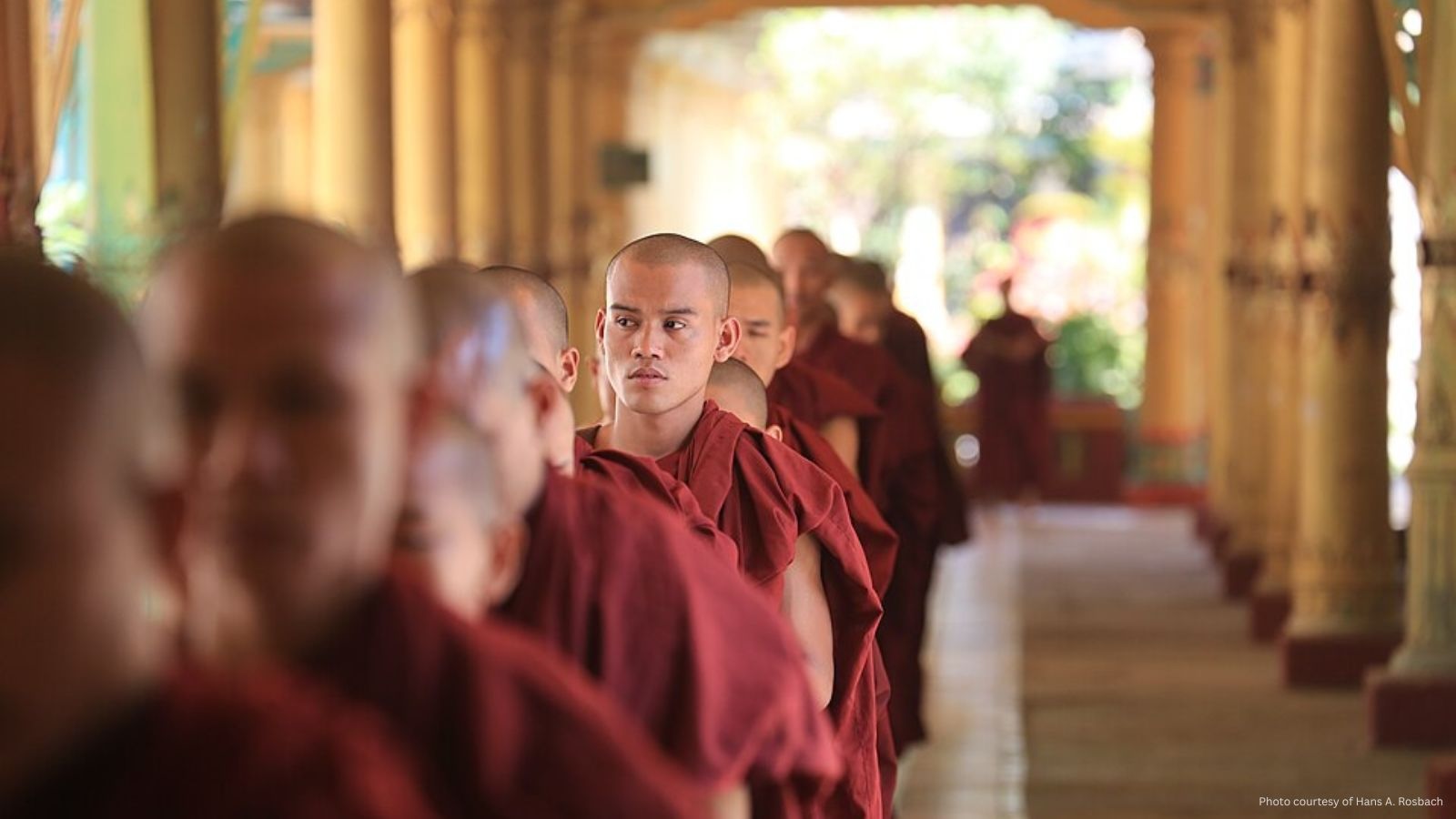 Buddhist monks in line for the meal at the monestary Kha Khat Wain Kyaung in Myanmar.