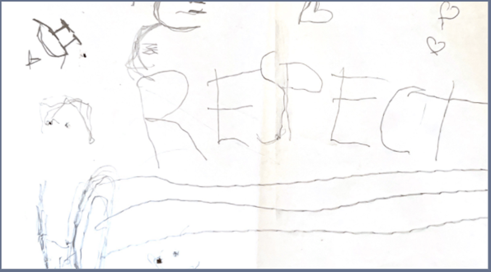 Figure 10: White notecard that says, "Respect" with designs drawn around it