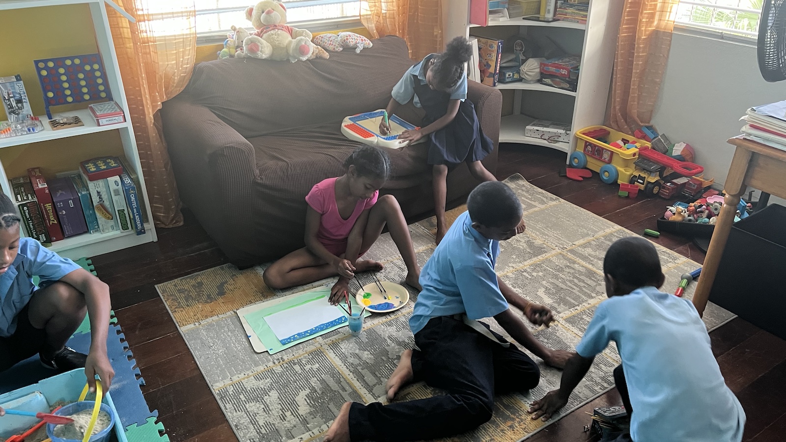 Students playing indoors