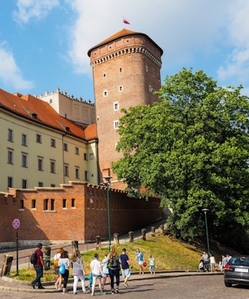 Students walking down a street in Krakow, Poland