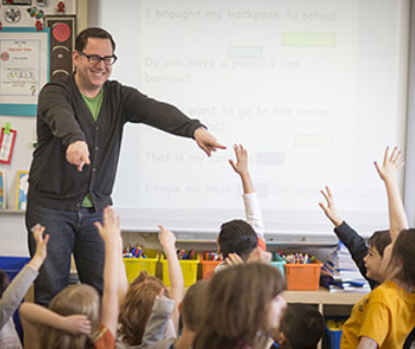 Students raising hands