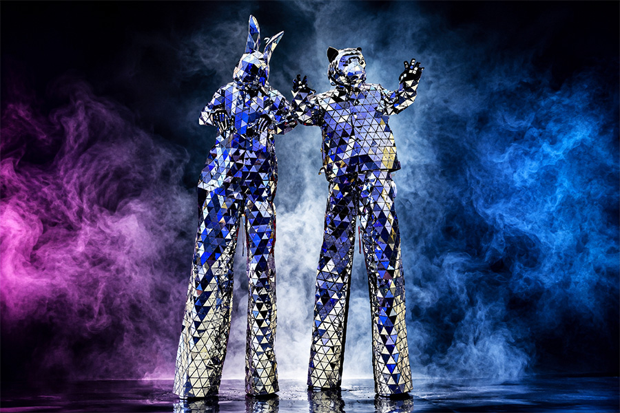 f1a8c550-9567-465f-91b9-7aeca4ff47dc-MirroredAnimalStiltWalkers-900×600-1