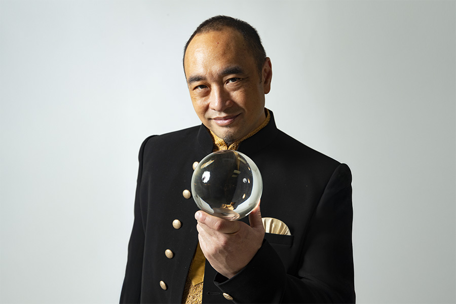 ID-5247932000128631044-Alain-Nu-headshot-crystal-ball-high-res1crop2-900×600-1