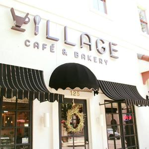 Village Cafe & Bakery logo