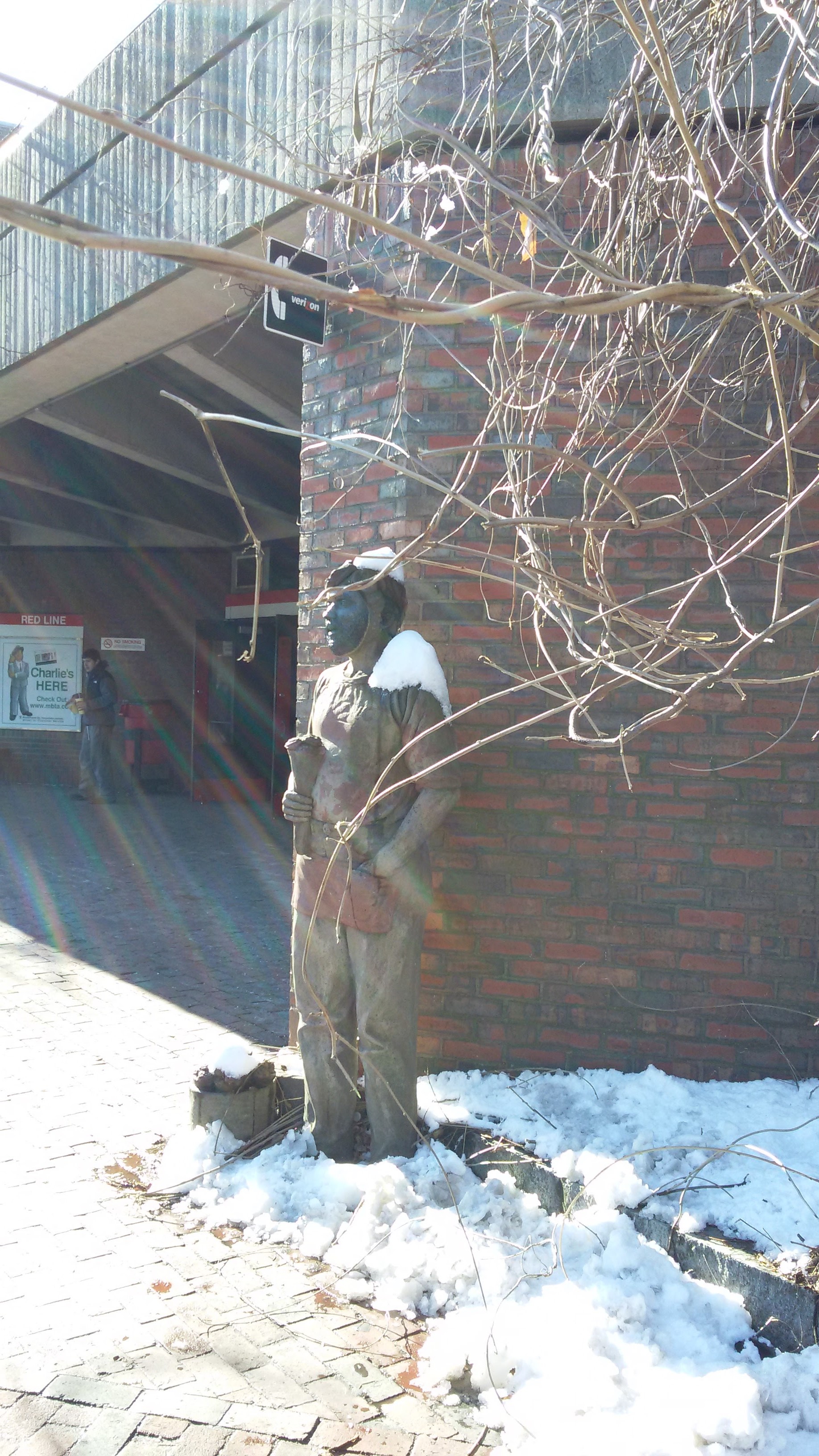 Statue outside the T stop in Davis Square