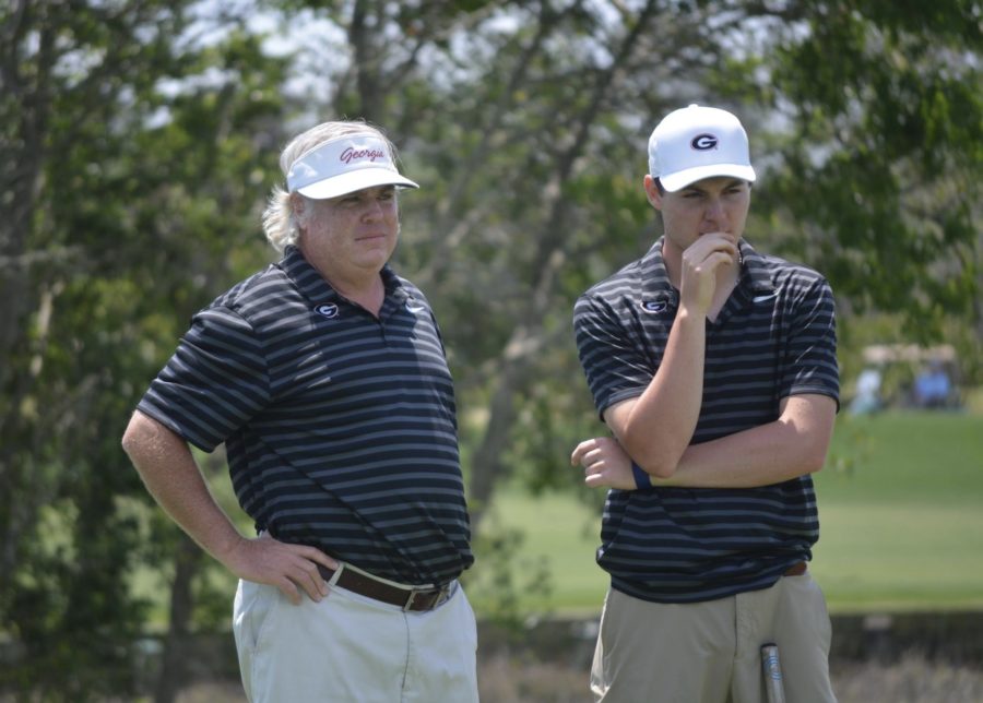 Georgia associate head coach Jim Douglas and Georgia’s Trevor Phillips during the SEC Championship at Sea Island Golf Club on St. Simons Island, Ga., on Thursday, April 26, 2018. (Photo by Steven Colquitt)