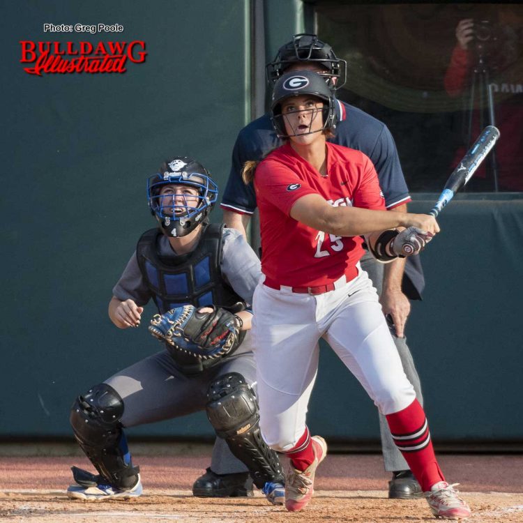 Lacey Sumerlin watches the ball rise from home plate