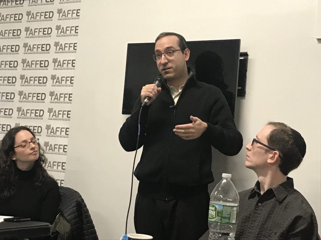 Rabbi Yossi Newfield at Repair the World in Crown Heights during a Hannukkah party and panel on secular education at certain ultra-Orthodox Jewish schools.