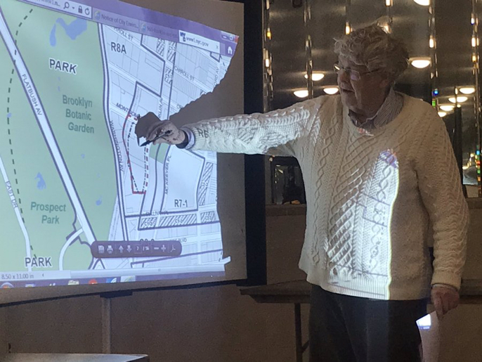 Prof. Brent Porter, a shadowing expert, shows how the two 39-story towers will block sun at parts of the Brooklyn Botanic Garden an additional three hours during winter months. (Photo: Kadia Goba/Bklyner)