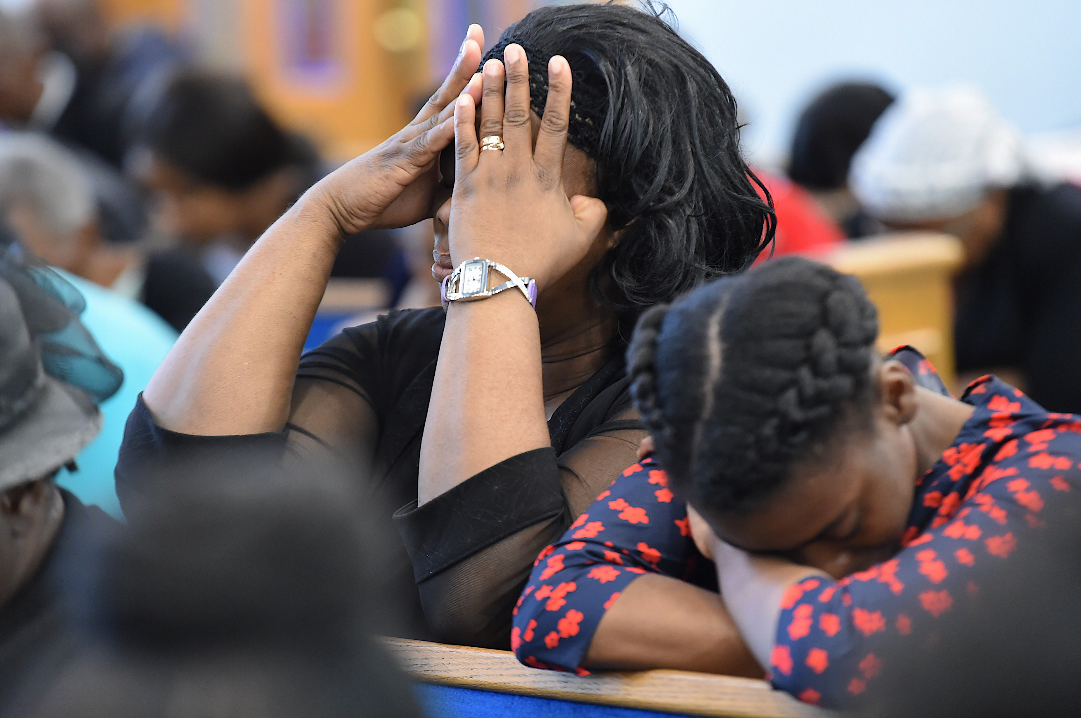 A congregation in prayer during Thrive NYC's Faith Weekend at the East New York Seventh Day Adventist Church (Todd Maisel/Bklyner)
