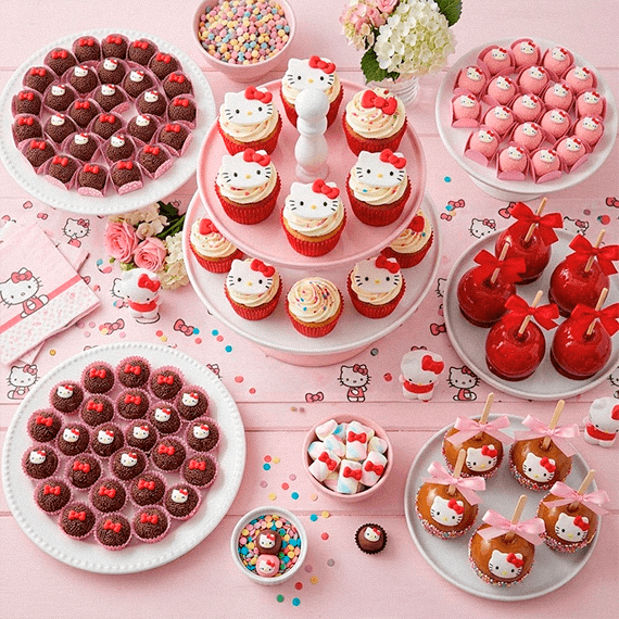 Mesa de doces de festa da Hello Kitty com brigadeiros, cupcakes e maçãs do amor
