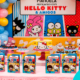 Mesa de festa de aniversário da Hello Kitty com painel, bolo e boleiras decoradas