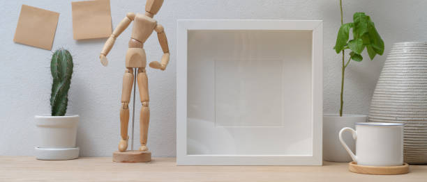 Action Figure Display Boxes And Action Figures Are Placed On The Wooden Table For Display