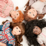 The realistic collectible dolls 18-Inch Doll Wigs depict early-era doll fashion.