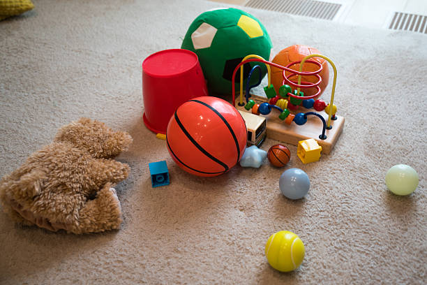 Various Basketball Toys for 5 Year Olds Scattered in the Living Room