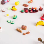 Miniature Items for Crafts: Bread, baguettes, pretzels, and other food made with polymer clay.