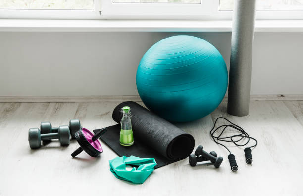 Various Fitness Equipment In The Gym, Including Exercise Balls, Foam Rollers, Resistance Bands, Jump Ropes, Dumbbells, And Yoga Mats, Also Fall Under The Category Of Sports Ball Sets