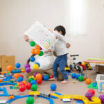 A Mother And Her Toddler Playing With Ball Toys At Home - Ball Toys For 3 Year Olds