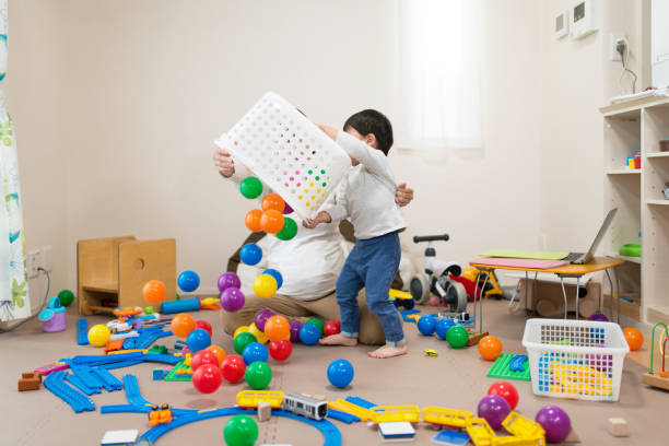 A Mother And Her Toddler Playing With Ball Toys At Home - Ball Toys For 3 Year Olds