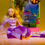 Barbie Doll Blonde is a fashion doll produced by the American toy company Mattel. Barbie is Mattel's most popular brand of dolls and accessories.