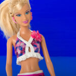 The Barbie Movie Bundle features fashionable styles, manufactured by Mattel since 1959.