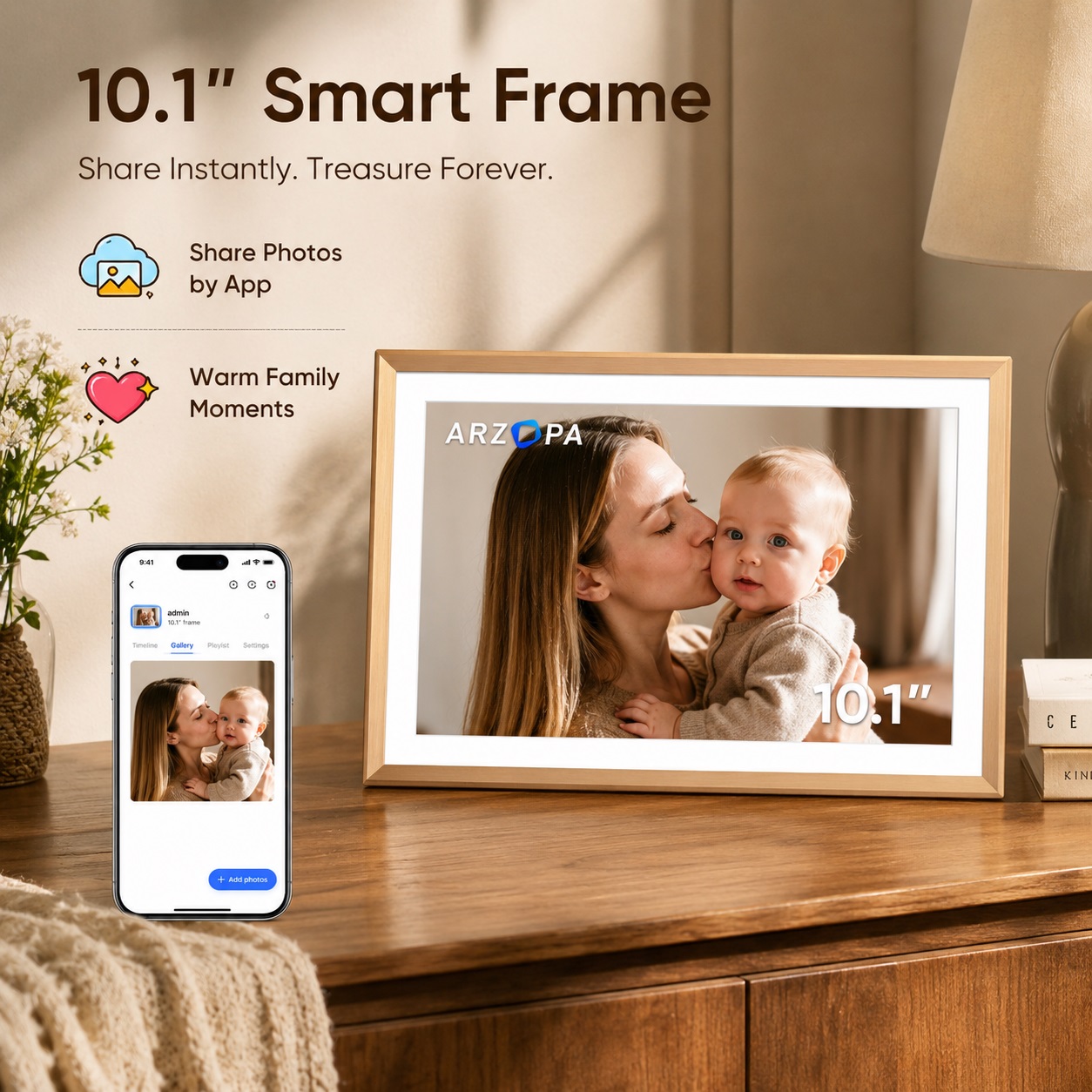 Front view of the ARZOPA D10 10.1" metal digital smart frame in champagne gold on a modern side table, displaying a photo of a mother kissing her baby. A smartphone next to it shows the app interface with the same photo, illustrating 'Share Photos by App'. Circular icons call out 'Share Photos by App' and 'Warm Family Moments'.