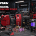 ARCCAPTAIN welding, cutting and workshop tool collection displayed in a professional garage, featuring plasma cutter, MIG205MP welder, welding helmet, flux core wire, tungsten electrodes, impact wrench and welding accessories.